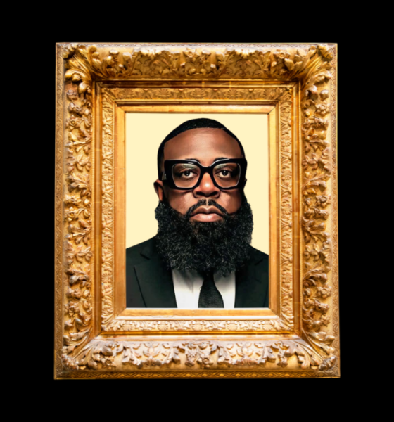 E. Tony Gaines in a golden frame with dark black background